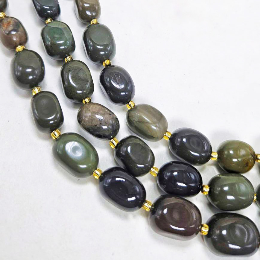 Бусины Окаменелое дерево размер 10*14мм натуральный камень